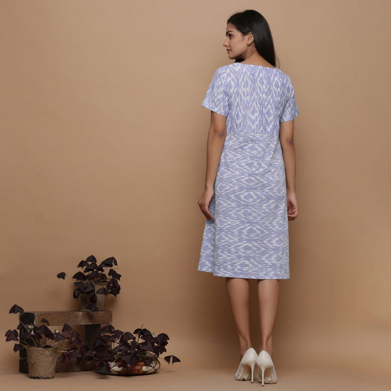 Back View of a Model wearing Handwoven Cotton Geometric Print Dress