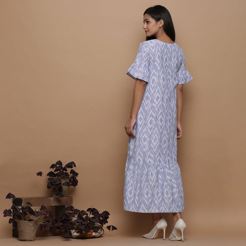 Back View of a Model wearing Ikat Powder Blue Button-Down Dress