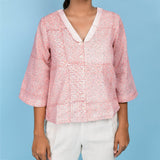 Front Detail of a Model wearing Powder Pink Block Printed 100% Cotton Chelsea Collar Shirt Top