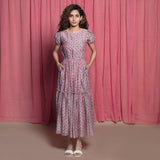 Front View of a Model wearing Powder Pink Chanderi Block Print Tier Peasant Dress