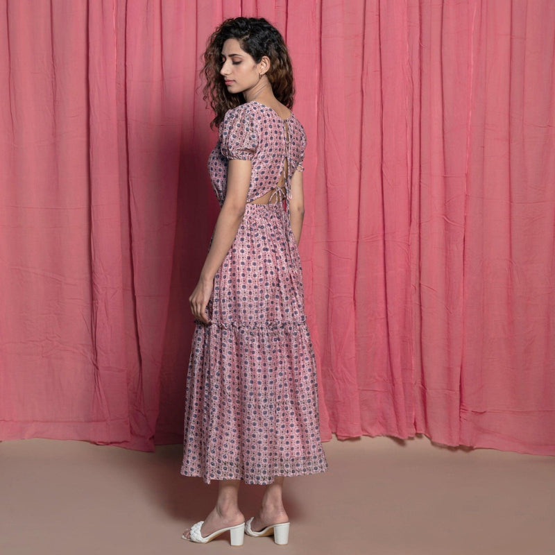 Left View of a Model wearing Powder Pink Chanderi Block Print Tier Peasant Dress