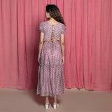 Back View of a Model wearing Powder Pink Chanderi Block Print Tier Peasant Dress