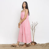 Left View of a Model wearing Powder Pink Gathered Maxi Yoked Dress