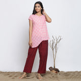 Front View of a Model wearing Powder Pink Checkered Cotton Paneled Top