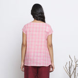 Back View of a Model wearing Powder Pink Checks Handspun Cotton Muslin Paneled Top