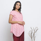 Right View of a Model wearing Powder Pink Checks Handspun Cotton Muslin Paneled Top