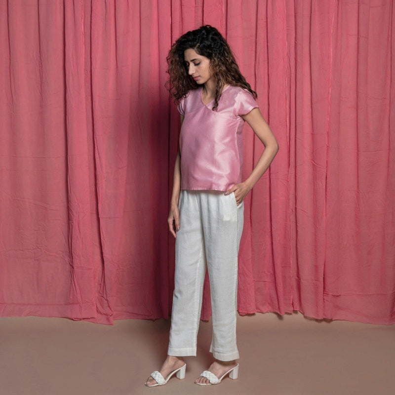 Left View of a Model wearing Powder Pink Chanderi A-Line Top