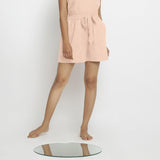 Front View of a Model wearing Powder Pink Vegetable Dyed Handspun Short Shorts