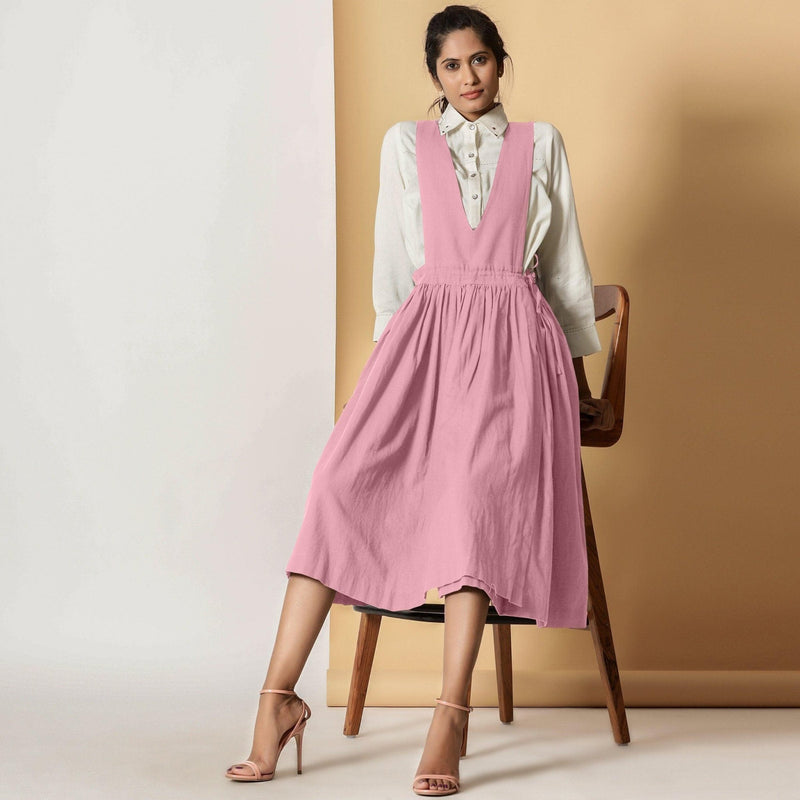 Front View of a Model wearing Powder Pink Cotton Flax Pinafore Midi Wrap Dress