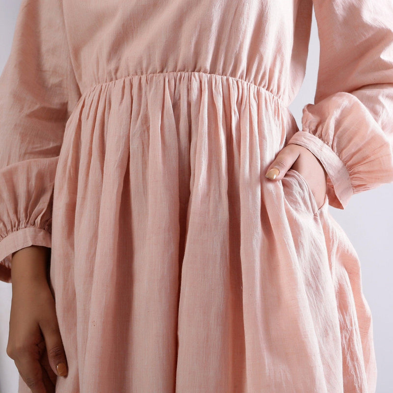 Front Detail of a Model wearing Powder Pink Backless Gathered Dress