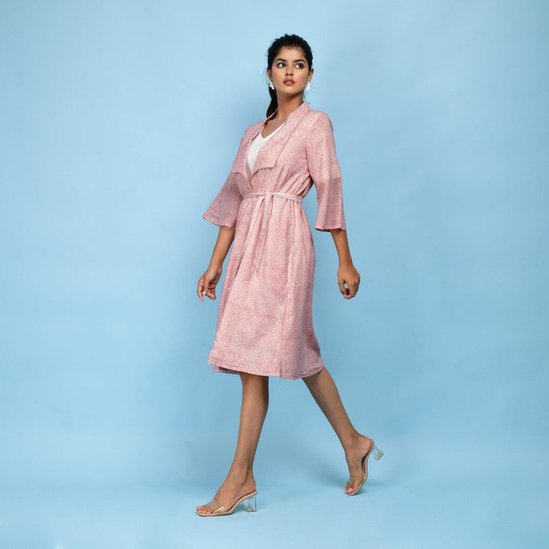 Left View of a Model wearing Powder Pink Block Printed 100% Cotton Knee-Length Overlay