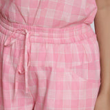 Front Detail of a Model wearing Powder Pink Handspun Mid Rise Shorts