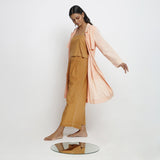 Left View of a Model wearing Vegetable Dyed Powder Pink Paneled Overlay