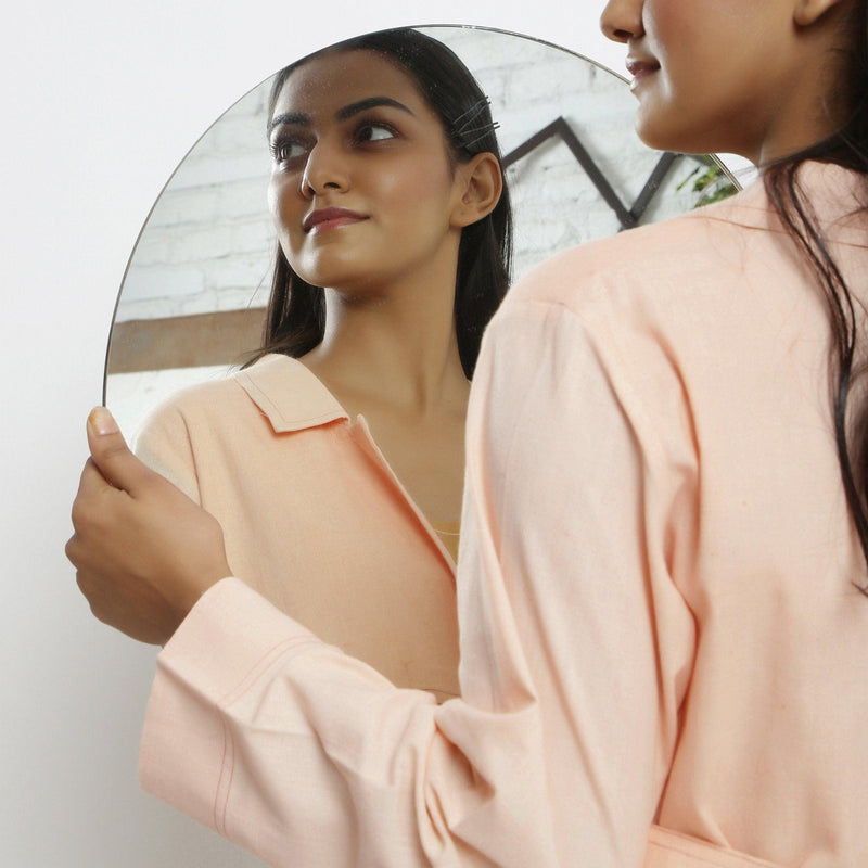 Front Detail of a Model wearing Powder Pink Vegetable Dyed Handspun Cotton Notched Collar Front Open Overlay