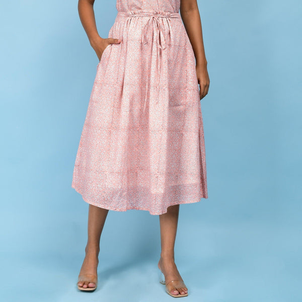 Front View of a Model wearing Powder Pink Block Printed 100% Cotton A-Line Skirt