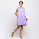 Front View of a Model wearing Purple Tie Dye Tier Dress