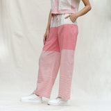 Left View of a Model wearing Red and Beige Striped 100% Cotton Mid-Rise Elasticated Straight Pant