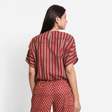 Back View of a Model wearing Block Printed Drop Shoulder Cotton Crop Top