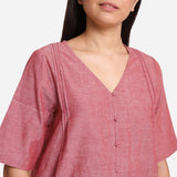 Front Detail of a Model wearing Handspun Red A-Line Button-Down Top