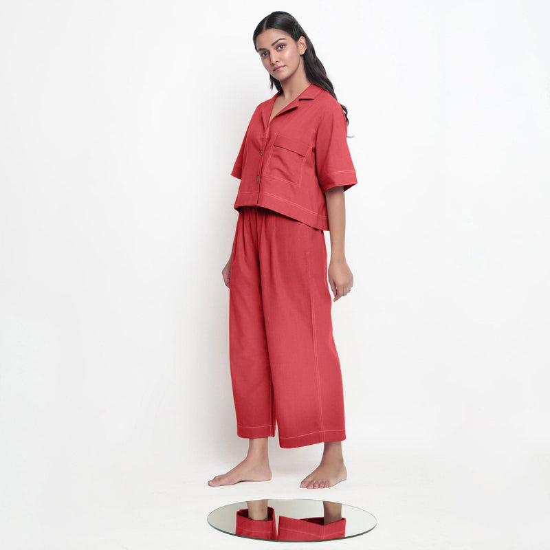 Left View of a Model wearing Red Handspun Shirt and Brick Red Pant Set