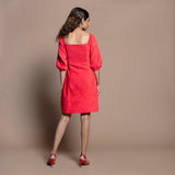 Back View of a Model wearing Red Cotton Velvet A-Line Panelled Dress