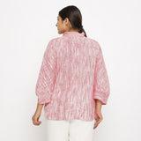 Back View of a Model wearing Pussy Bow High-Low Blouse