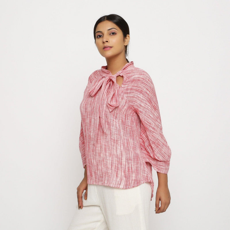 Left View of a Model wearing Red Crinkled Cotton Pussy Bow A-Line Blouse