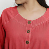 Front Detail of a Model wearing Vegetable-Dyed Red 100% Cotton Button-Down Dress