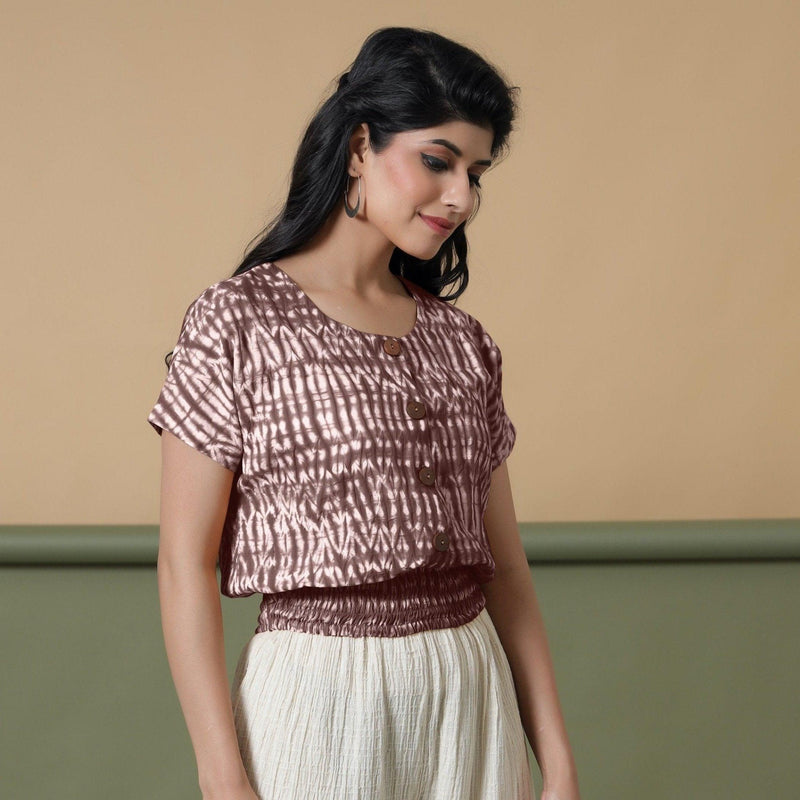 Right View of a Model wearing Red Shibori Tie-Dyed 100% Cotton Blouson Top