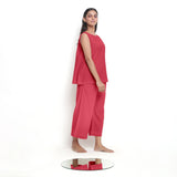 Right View of a Model wearing Vegetable Dyed Red Boat Neck A-Line Top