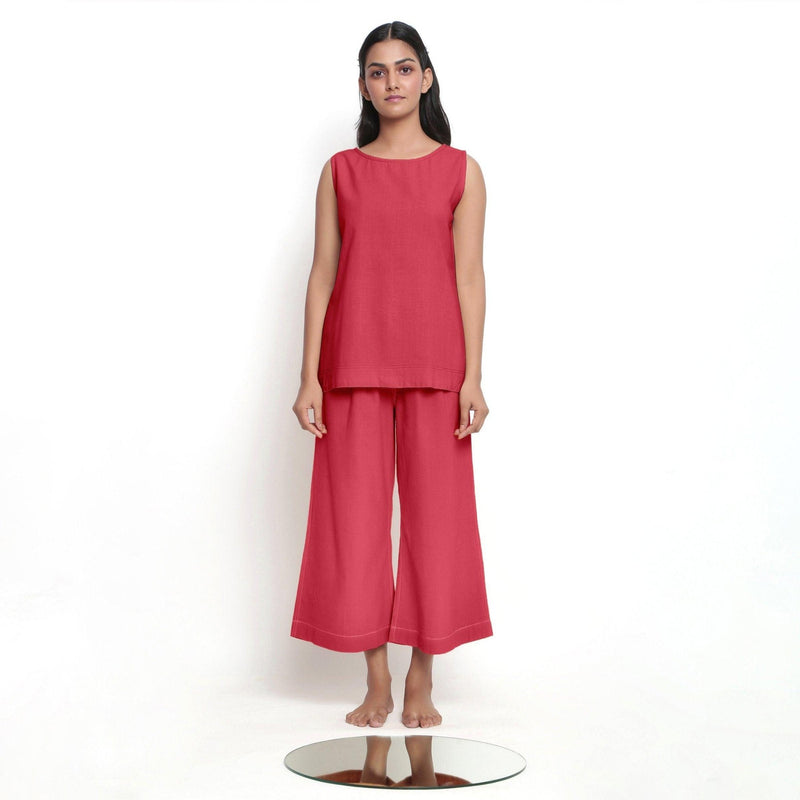 Front View of a Model wearing Vegetable Dyed Red Boat Neck A-Line Top