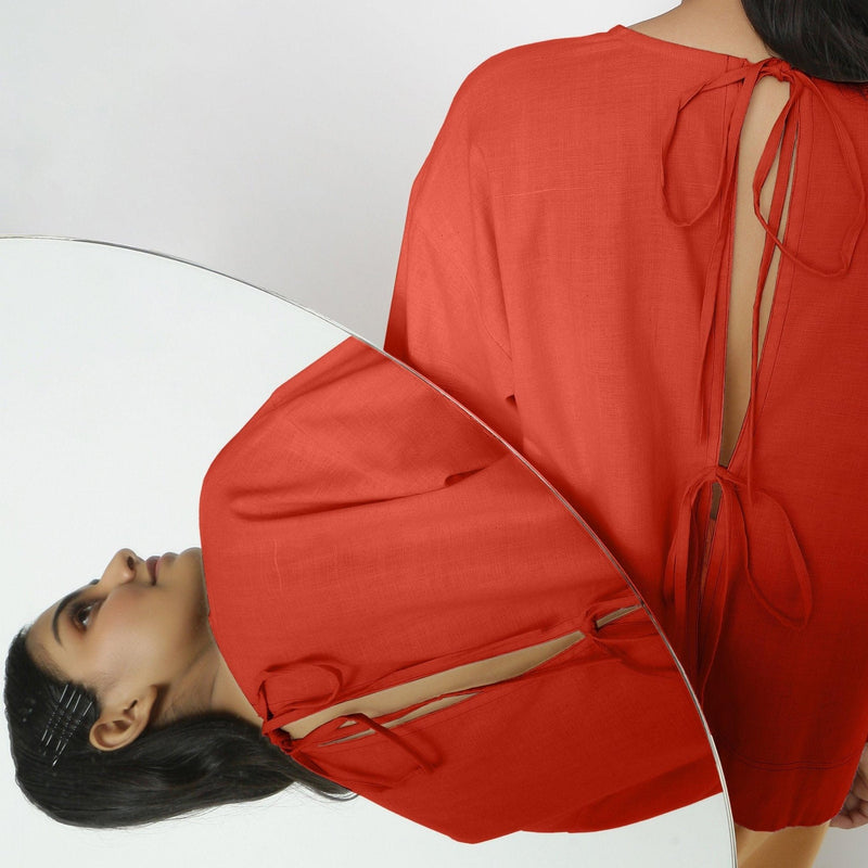 Back Detail of a Model wearing Vegetable-Dyed Red 100% Cotton Straight Top