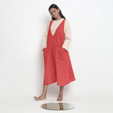 Left View of a Model wearing Red Handspun Cotton Deep Neck Shift Dress