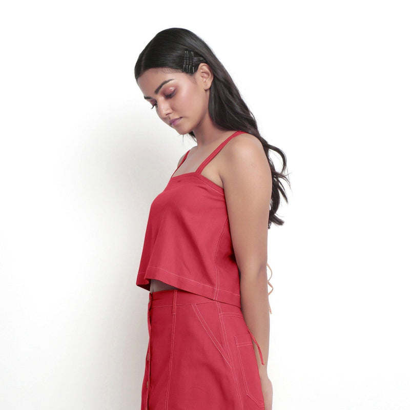 Left View of a Model wearing Vegetable-Dyed Red 100% Cotton Spaghetti Top