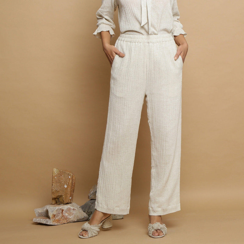 Front View of a Model wearing Undyed Elasticated Mid Rise Ecru Pant