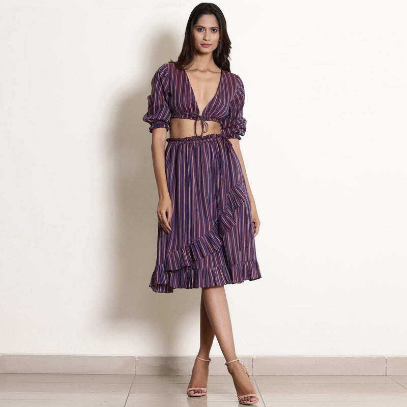 Front View of a Model wearing Reversible Plunge Neck Top and Wrap Skirt Set