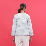 Back View of a Model wearing Reversible Block Print Quilted Cotton Short Jacket