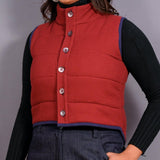 Front Detail of a Model wearing Reversible Blue and Red Warm Cotton Waffle Sleeveless Quilted Puffer Jacket