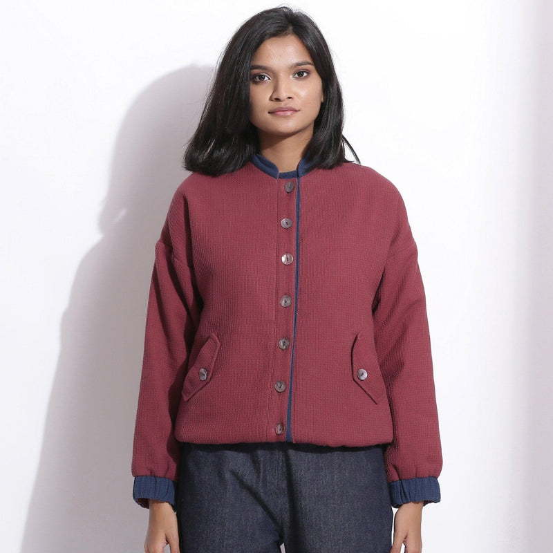 Front View of a Model wearing Reversible Blue Red Warm Cotton Waffle Bomber Jacket