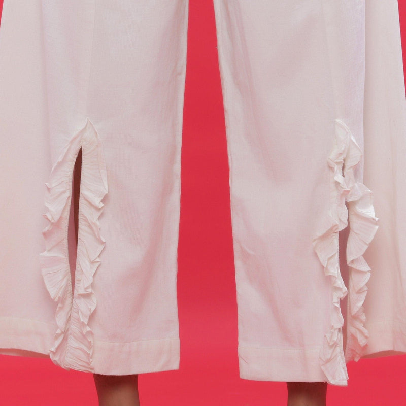 Close View of a Model wearing White Corduroy Slit Wide-Leg Pant