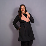 Right View of a Model wearing Reversible English Rose and Black Warm Cotton Flannel Front Open Overlay Coat