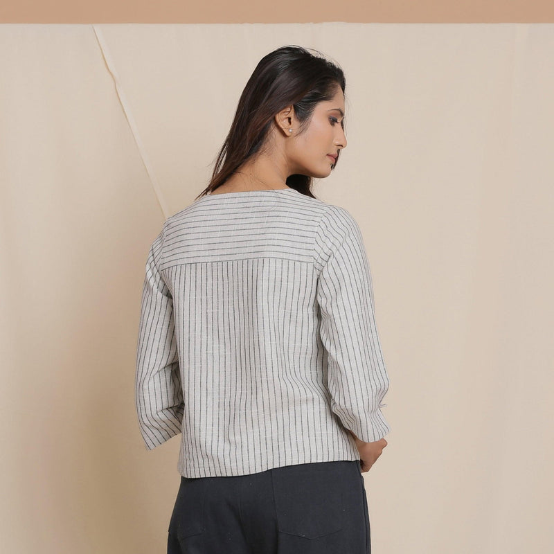 Back View of a Model wearing Reversible Grey Warm Cotton Button-Down Short Top