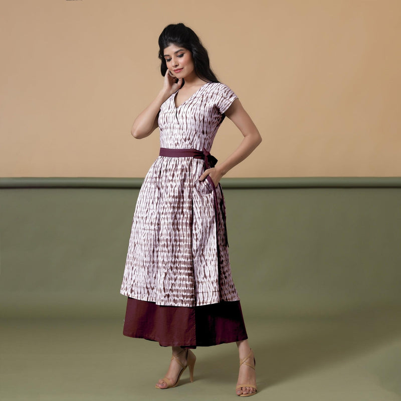 Left View of a Model wearing Reversible Maroon Tie-Dye Cotton V-Neck Maxi Wrap Dress