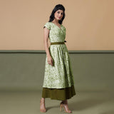 Right View of a Model wearing Reversible Moss Green Tie-Dye Cotton Maxi Wrap Dress