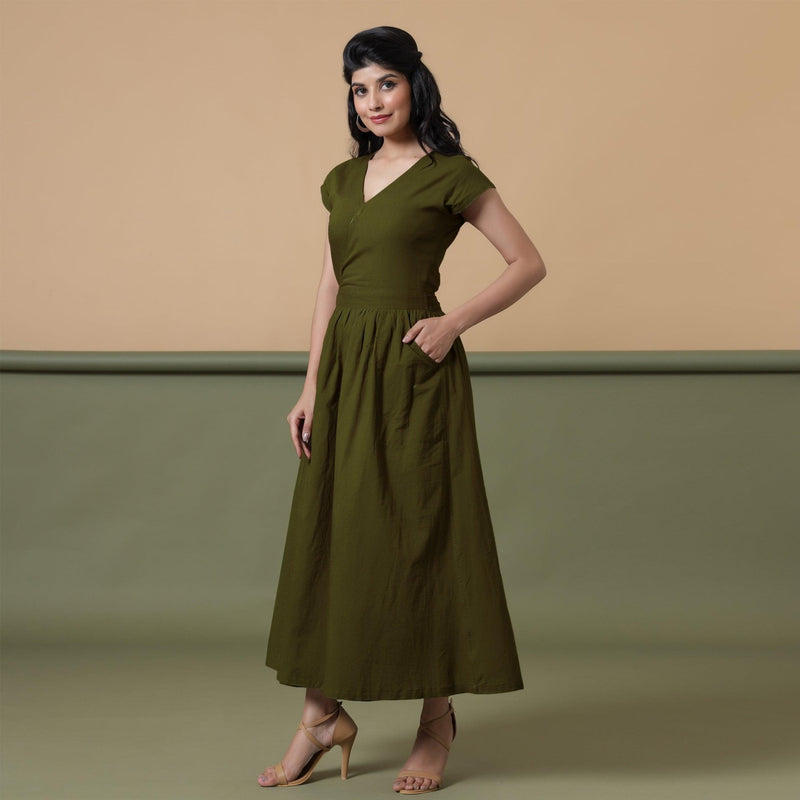 Left View of a Model wearing Reversible Moss Green Tie-Dye Cotton Maxi Wrap Dress