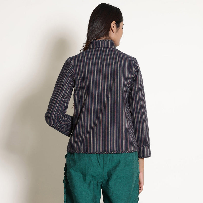 Back View of a Model wearing Pine Green Reversible Asymmetric Jacket