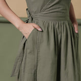 Front Detail of a Model wearing Reversible Shibori Green Wrap Dress