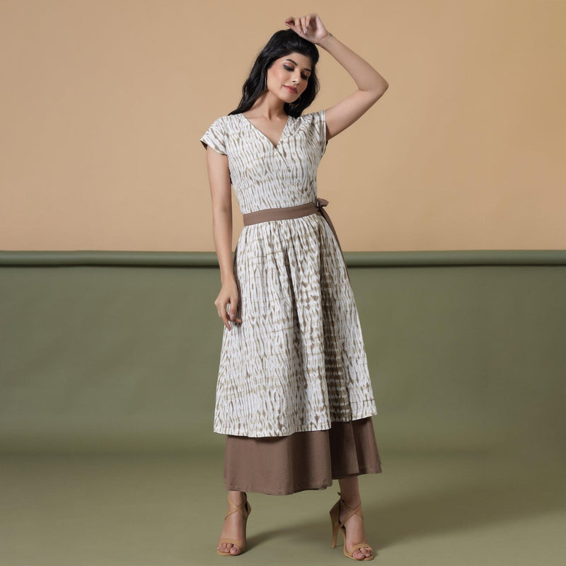 Front View of a Model wearing Reversible Taupe Tie-Dye Cotton V-Neck Maxi Wrap Dress