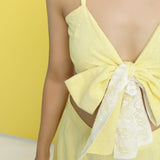 Front Detail of a Model Wearing Reversible Cotton Lace Tube Top