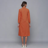 Back View of a Model wearing Reversible Convertible Corduroy Button Down Jacket Dress